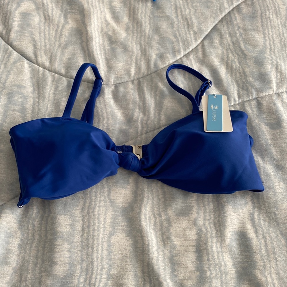 Brand new tag on , blue cup she , size M
